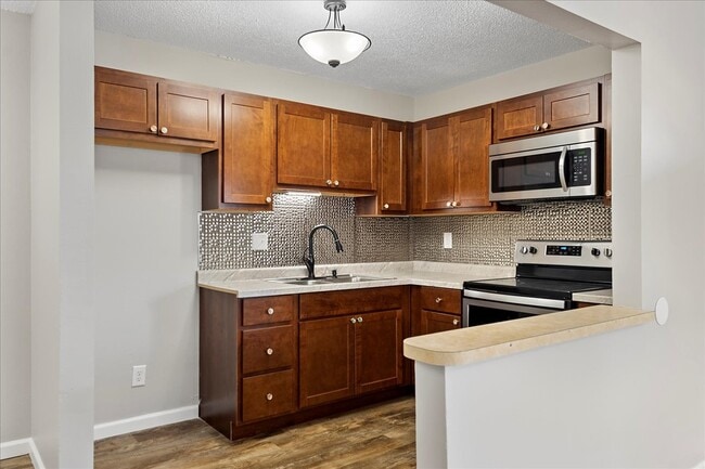 Building Photo - The District Apartment Homes