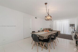 Building Photo - 6039 Collins Ave