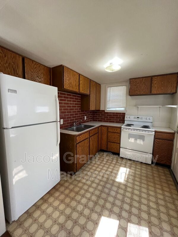 Building Photo - 1849 Higbee Ave