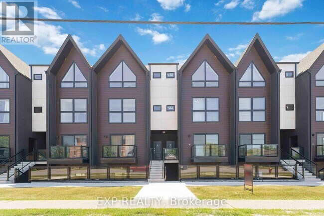 Photo du bâtiment - 7277-7277 Wilson Crescent