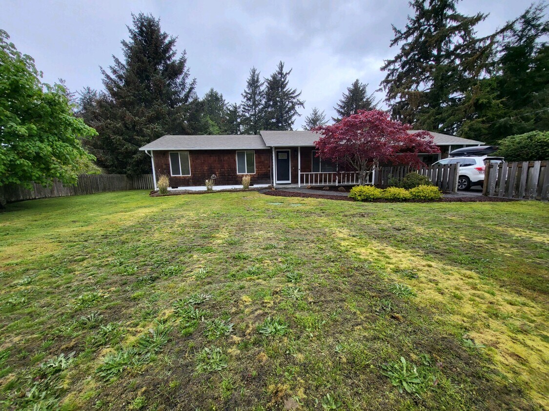 Front of home in private setting - 234 Woodland Ave