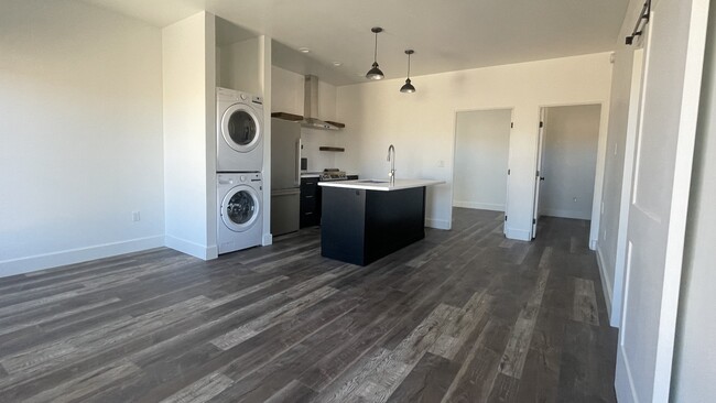 Kitchen w/island and new appliances - 100 Second St