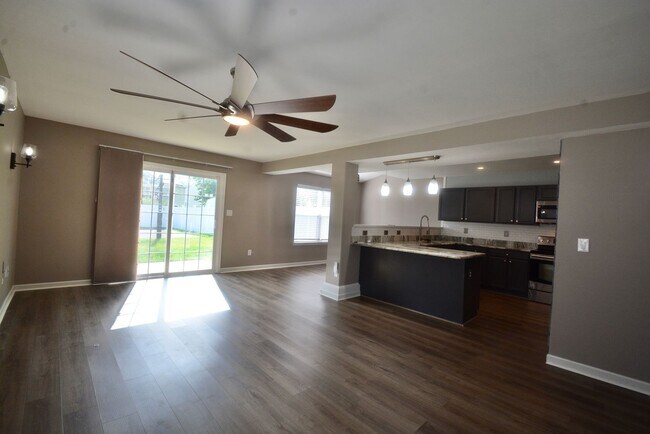 Building Photo - Stunning and Beautifully Updated Twin Home 3 Bedroom - Fenced In Backyard with a Basketball Court