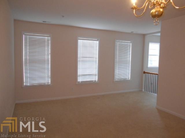 Building Photo - 4693 Creekside Villas Way