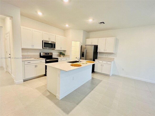 Foto del edificio - 6949 Harbours Edge Ave