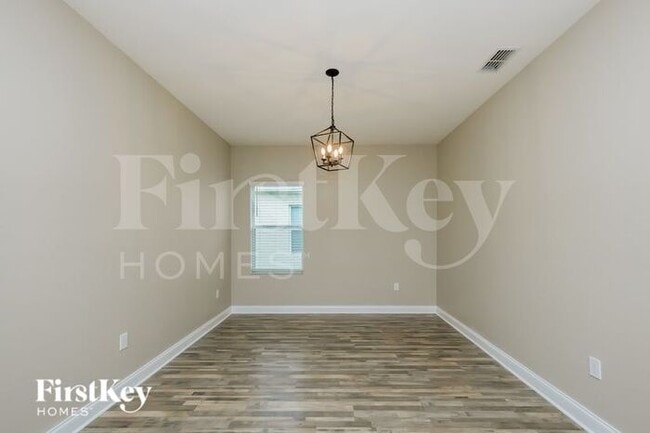 Building Photo - 5952 Valentino Way