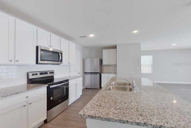 Building Photo - 8696 SW 44th Ct