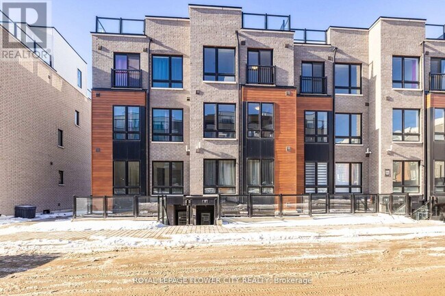 Photo du bâtiment - 245-245 McLevin Ave