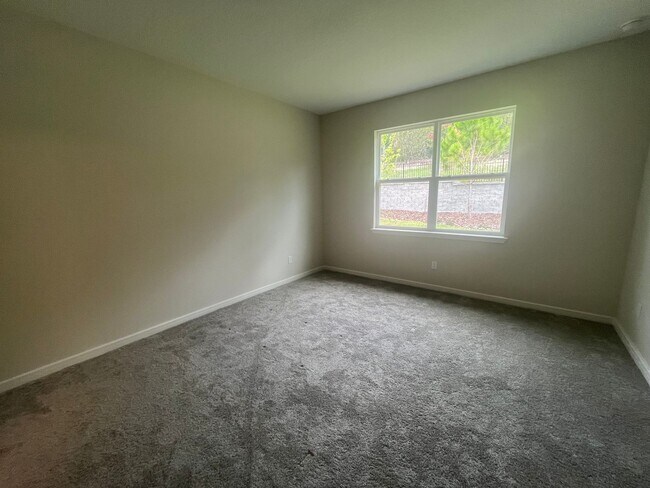 Building Photo - Welcome to this BRAND NEW 4-bedroom, 2-bathroom home located in the community of Canopy Terrace