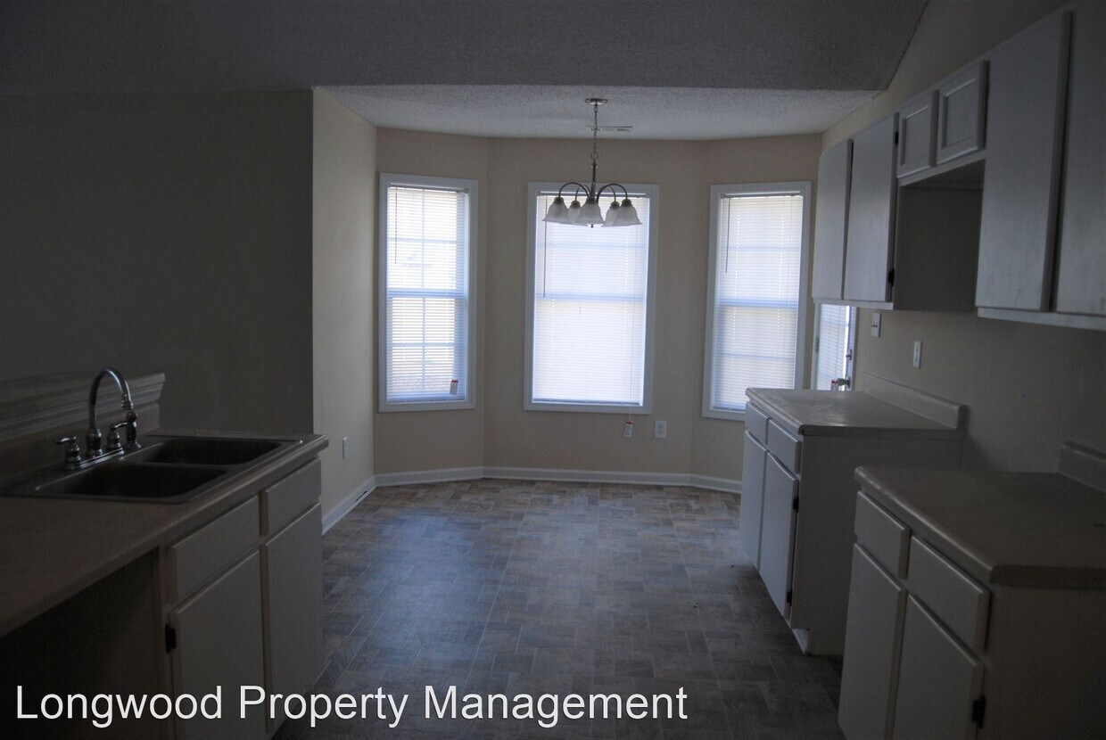 Building Photo - 3 br, 2 bath House - 7032 Mahonia Pl