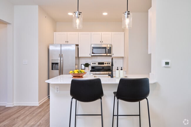 Floor Plan A - 2 BR, 2 BA - 1100 SF. Kitchen. - Genesee Pointe Apartments