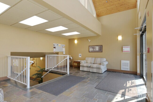 Building Photo - High-End Top-Floor 1 Bed + Den Condo with New Flooring & Paint in Central Chilliwack