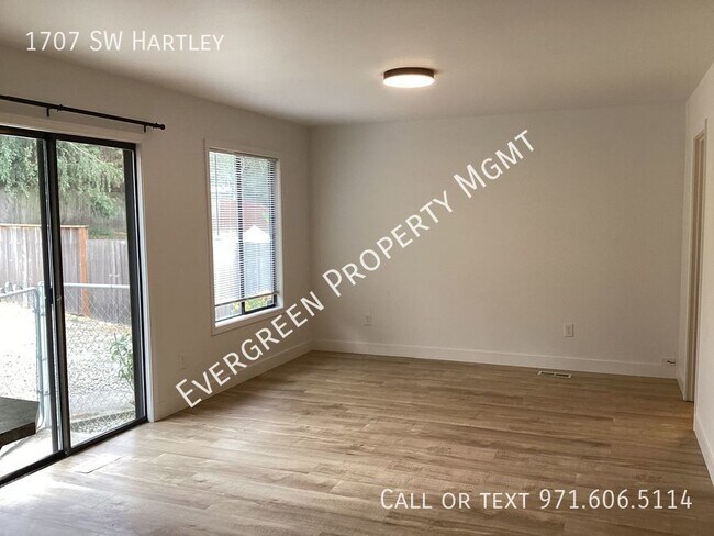 Building Photo - Renovated Home with Soaring Vaulted Ceilin...