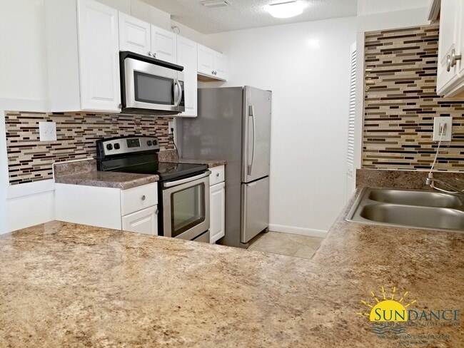 Building Photo - Nice 2 Bedroom Unit at Spanish Villas