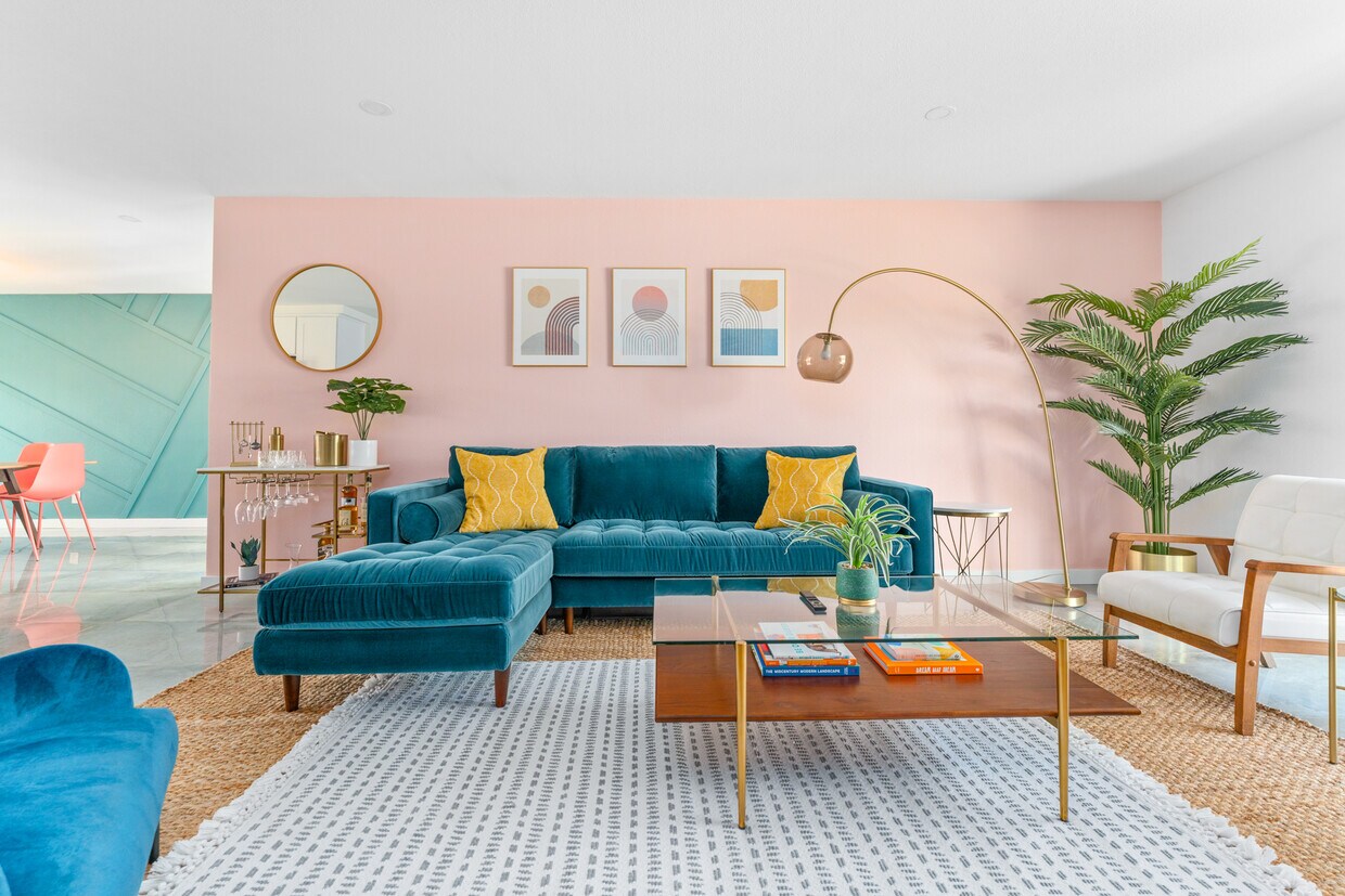 Find your place on the comfy living room sofa. - 2104 N Volturno Rd