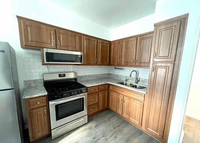 Building Photo - 25-52-52 73rd St