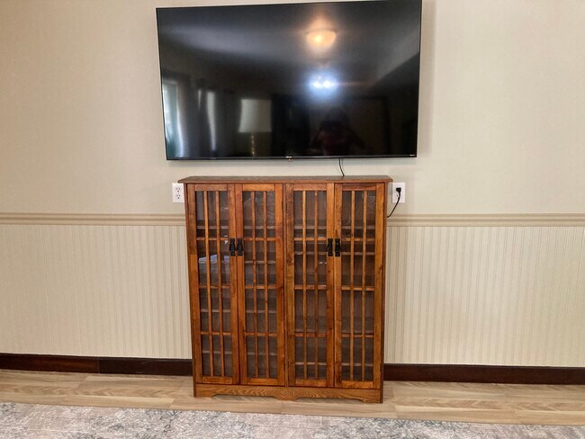 58" smart TV media center - 9399 Smith Rd