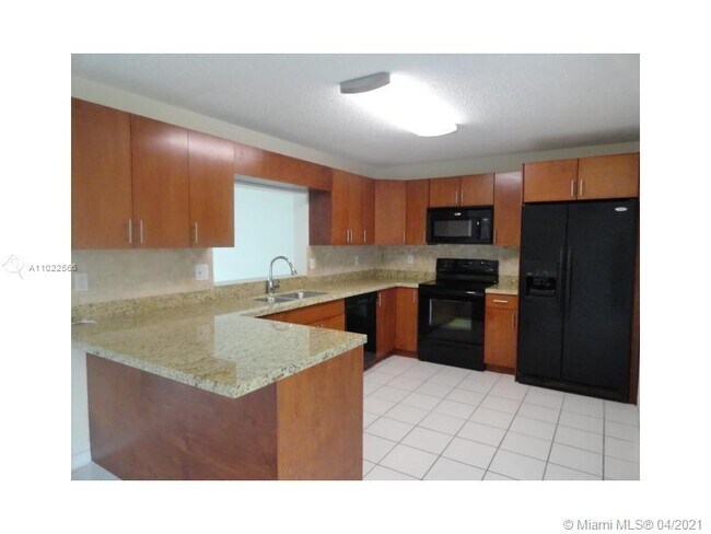 Building Photo - 3841 NW 122nd Ter