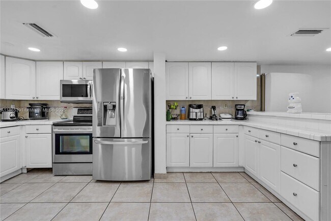 Foto del edificio - 4428 W 10th Ct