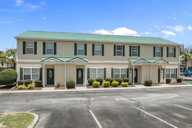 Building Photo - Where your commute is shorter than the Starbucks drive-thru line on 501. Grab the keys before som...