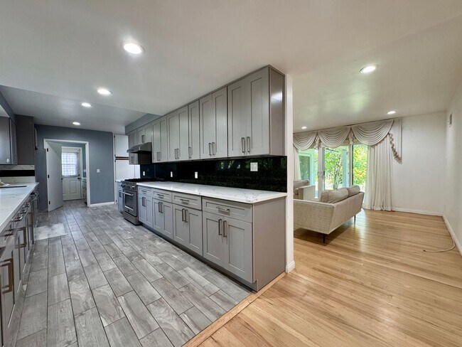 Building Photo - Four Bedroom/Four Bathroom Fullerton House...