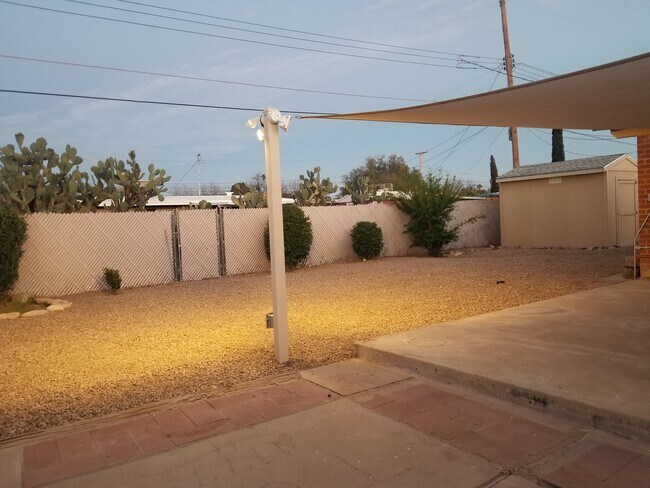 Spacious yard with large shed for storage - 4342 N Radin Ave