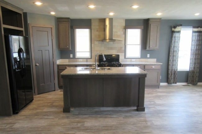Island Kitchen with Granite Counters - East Village Estates