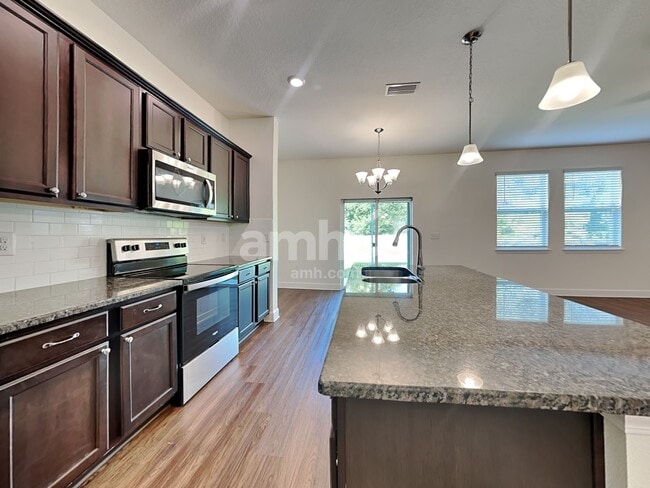 Building Photo - 6605 Hidden Rose Pl