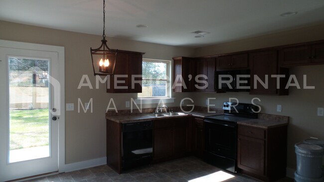Building Photo - Home For Rent in Vance! Available to View ...