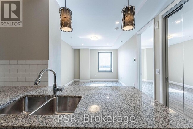 Photo du bâtiment - 118 King St E