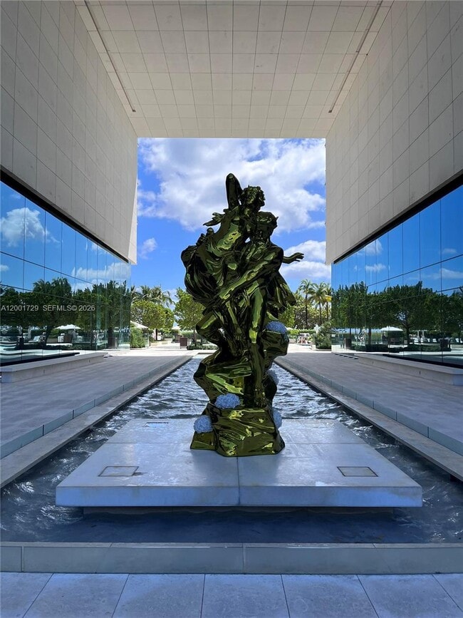 Building Photo - 10201 Collins Ave