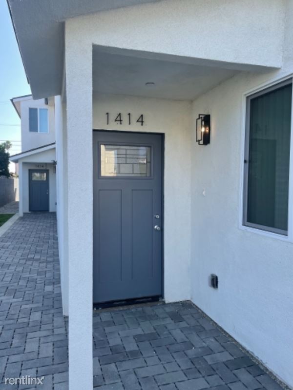Building Photo - 7 br, 4 bath Townhome - 1414 1/2 E 23rd St