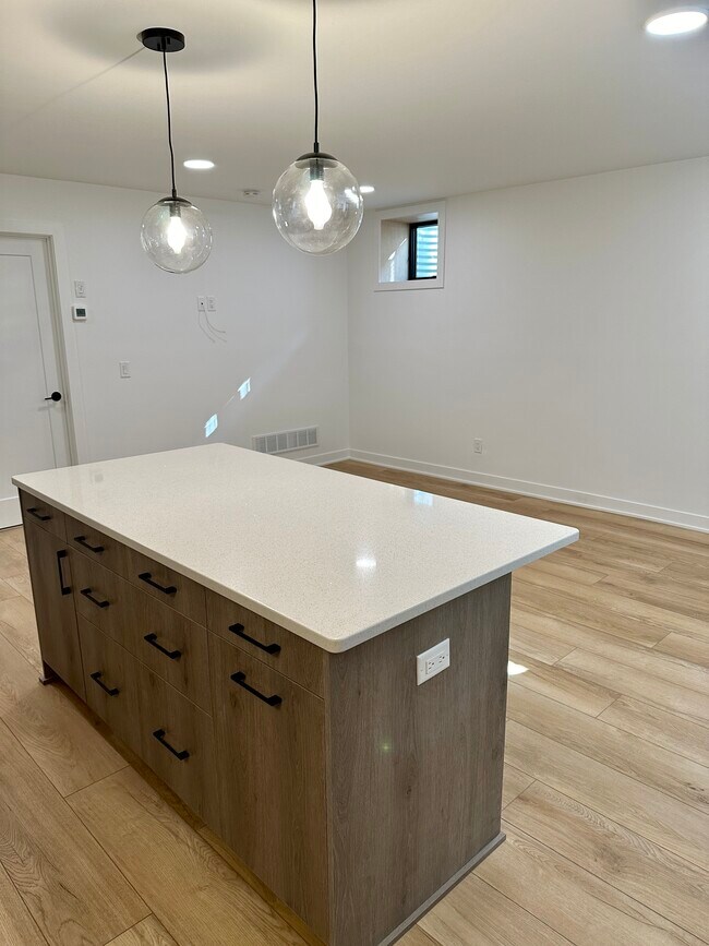 Plenty of room for entertainment center and work space. - 4600 36th Ave S
