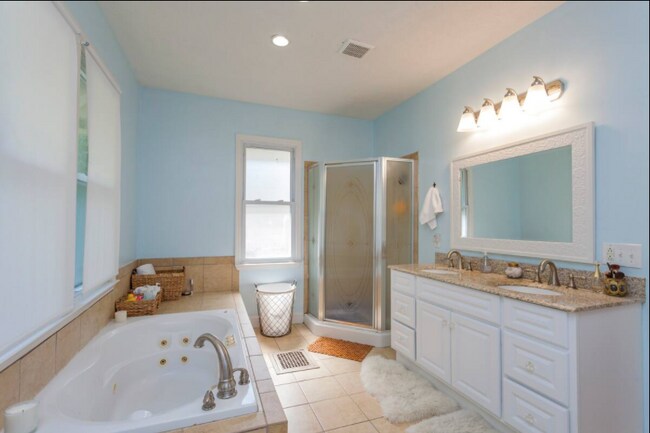 Master Bath with soak tub, stand up shower, and double vanities - 1125 McChesney Ave