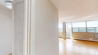 Located at 120 Shelborne Ave in Toronto's vibrant Glencairn neighbourhood, this 3-bedroom, 1-bathroom unit offers a well-proportioned layout filled with natural light. Classic parquet wood flooring runs throughout the living areas and bedrooms, lending warmth and timeless character to the space. Large windows frame pleasant outdoor views of the surrounding treetops and cityscape, while baseboard heating units ensure year-round comfort. The expansive primary bedroom is notably generous in size, offering ample room for furnishings and featuring a large window that invites natural light. The two additional bedrooms are well-sized and versatile, each with the same warm parquet flooring and neutral grey walls. The kitchen is clean and functional, finished with white cabinetry, marble-look countertops, and tile flooring, and opens through a doorway into the bright main living area. The bathroom is neatly appointed with a full-sized soaker tub and shower combination, with fully tiled white walls. A hallway connects the rooms efficiently, completing a practical and comfortable floor plan well-suited for families or shared living.