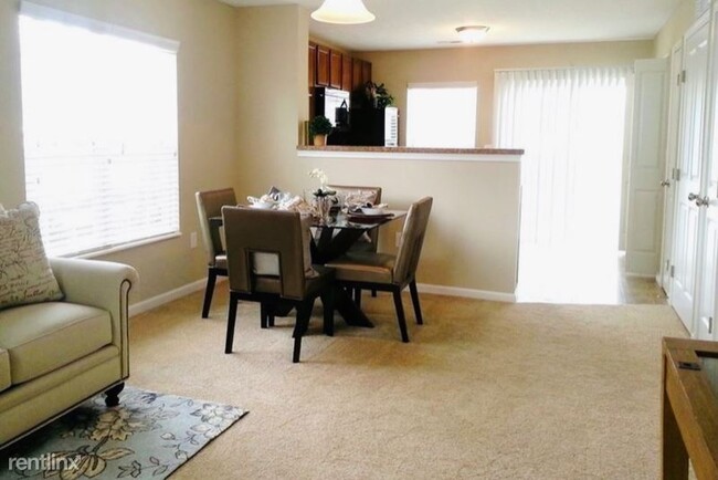 Building Photo - 2 br, 1.5 bath Condo - 7418 Sancus Blvd