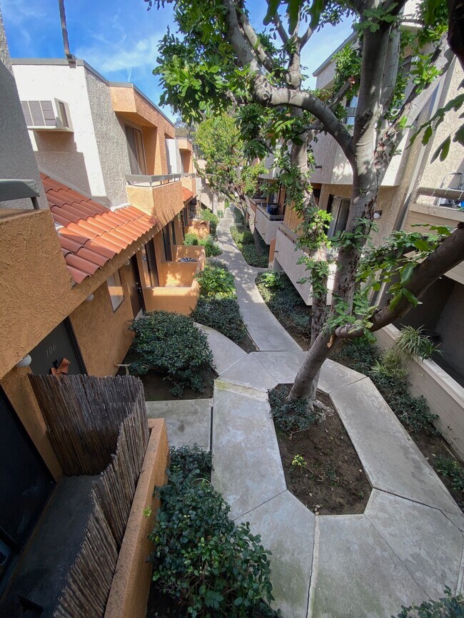 Walkway from the Front Entrance - Villa Marbella Apartments
