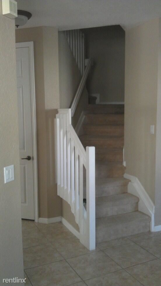 Building Photo - 4 br, 2.5 bath Condo - 16122 Poppyseed Cir...