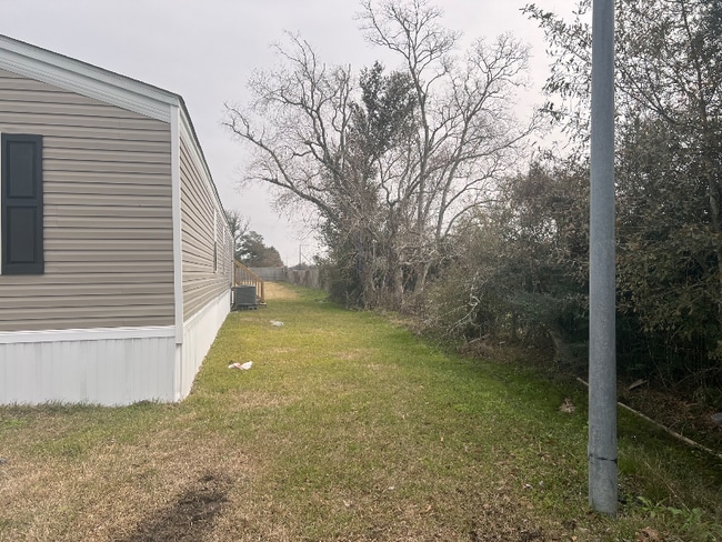 Building Photo - 5859 Tom Hebert Rd