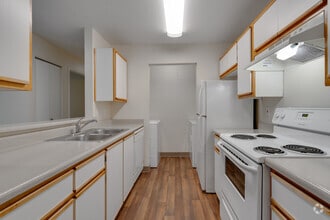 2BR, 2BA - 920SF - Kitchen & Laundry - Westbury Apartments
