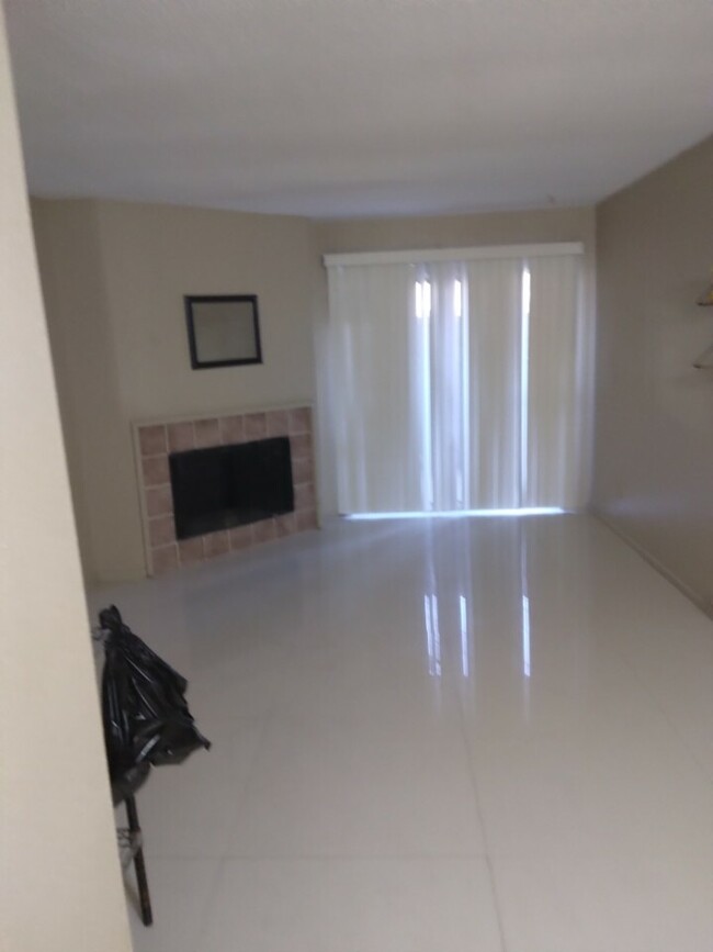 living room into patio - 9350 Country Creek Dr