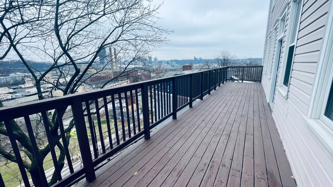 Porch w/ City View - 1147 Basin St