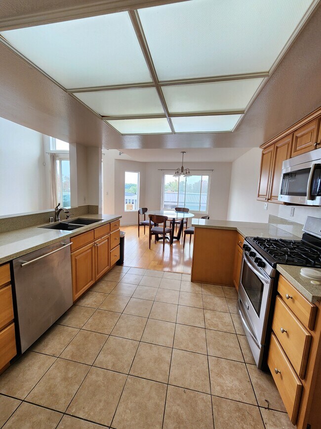 Open kitchen leads to dining area - 2677 Centinela Ave