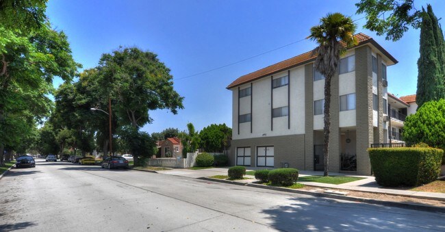 Building Photo - Bright Villa Apartments