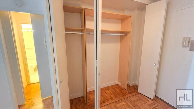 Building Photo - Bright Ninth-Floor Studio with Exceptional Closet Space near the UN