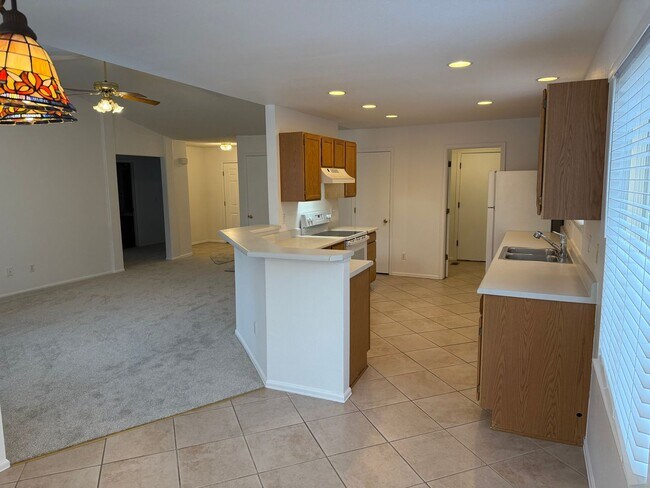 Building Photo - Spacious 4-Bedroom Ranch with Finished Bas...