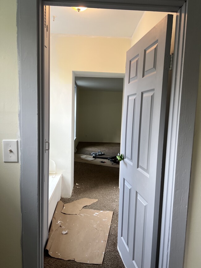 Hallway from guest room to main living room - 64 N Main St