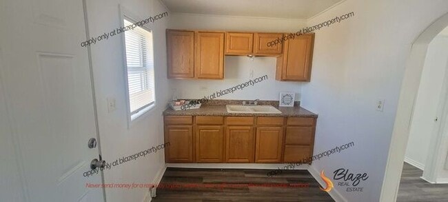 Building Photo - Cozy Corner, Big Potential!