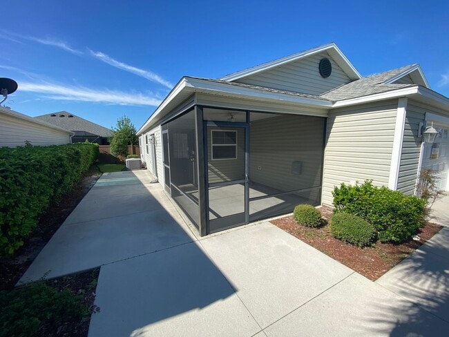 Building Photo - Resort Living in This UNFURNISHED Annual Rental in The Village of Fenny, Patio Villa, 2 bed, 2 bath.