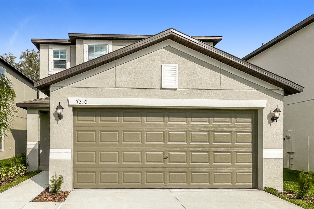 7310 Spring Snowflake Ave, Palm RiverClair Mel, FL 33619 House